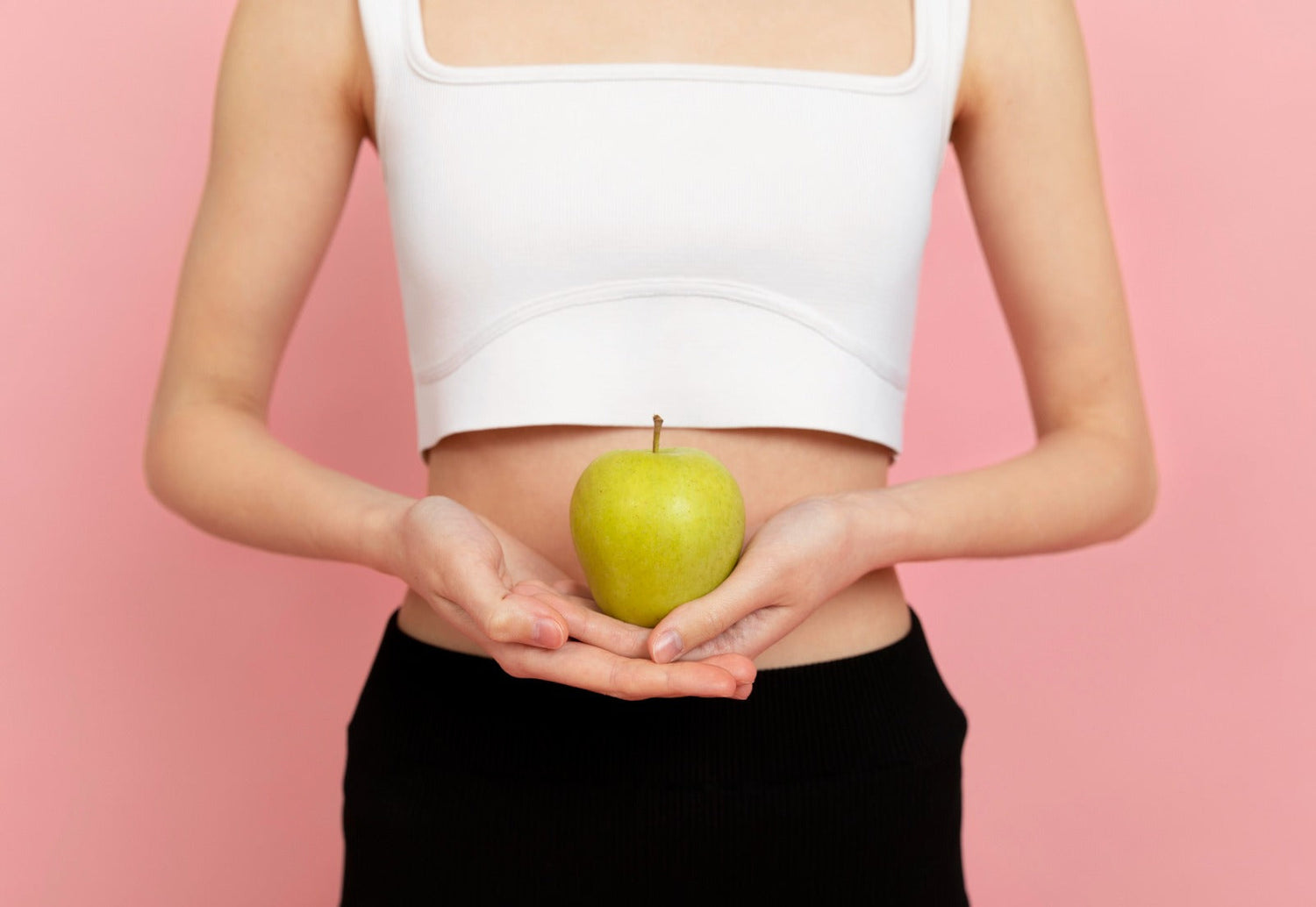 A girl holding apple